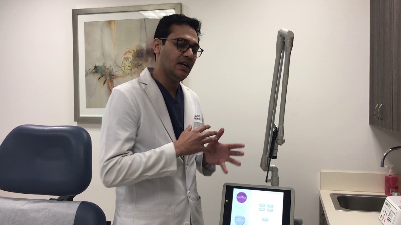 Medical professional explaining treatment in clinic.