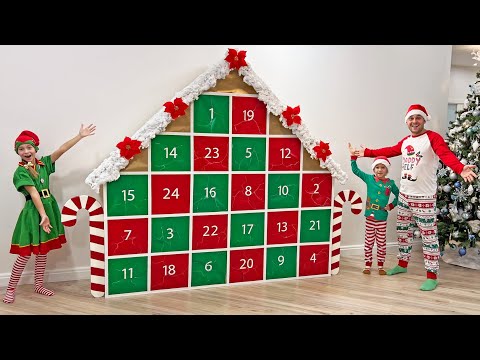 Kids open the Christmas Advent Calendar with Surprises and Gifts