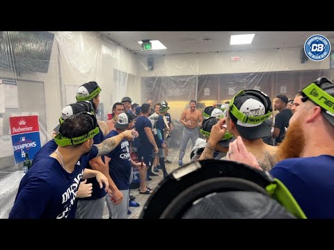 Shohei Ohtani's interpreter Will Ireton & Dodgers trainers on Slip 'N Slide for NL West celebration