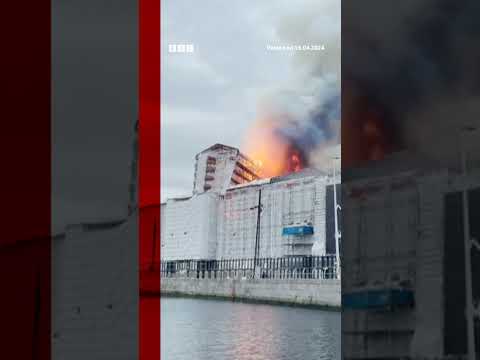 Copenhagen's historic stock exchange has been engulfed in a fire. #Shorts #Copenhagen #BBCNews