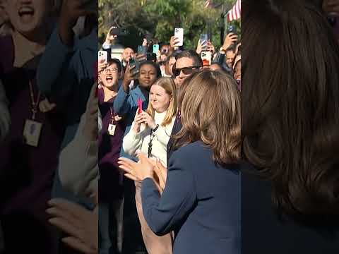 Harris returns to cheering staff at White House