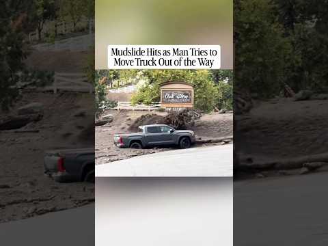 Mudlside hits as man tries to move pickup truck out of the way