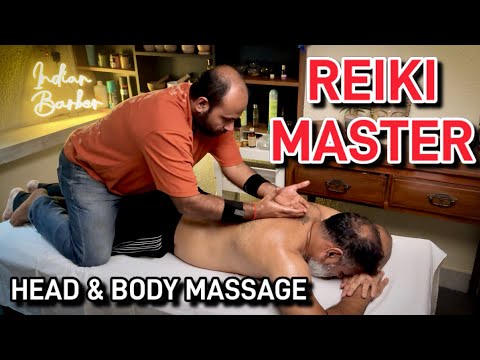 Reiki master performing Head massage, upper body massage to reduce stress n Anxiety , Indian barber,