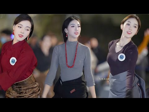 Admiring beautiful Tibetan women, traditional Tibetan dance and Tibetan song