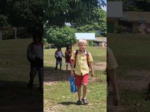 Cute, foreign blond boy in a Filipino public school π