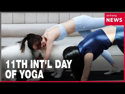 YouTube video thumbnail: Yoga Enthusiasts Celebrate International Yoga Day in Rio and Bali
