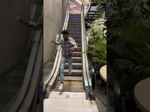 Escalator challenge😂#shortsvideo #youtubeshorts