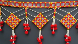 Handcrafted Grid Toran with Red PomPoms & Pearl Drops | Traditional Toran Design