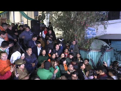Supporters of Rodrigo Paz gather after preliminary results in Bolivia's general election | AFP