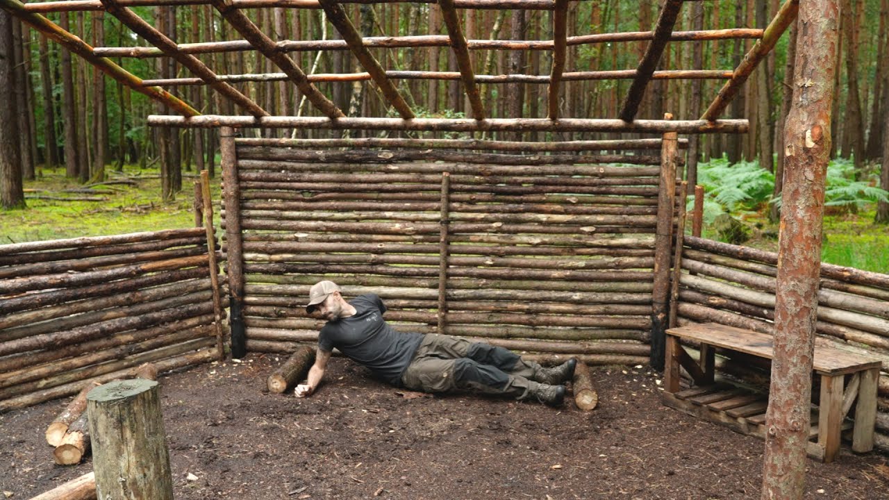 Building a Bushcraft Survival Shelter - Roof Frame & Bed