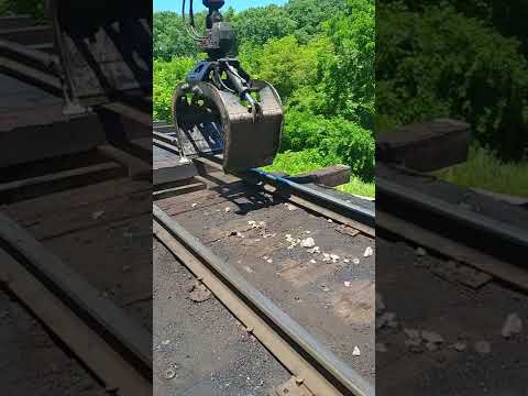 Pulling Out Railroad Bridge Timbers with Grapple Truck #shorts