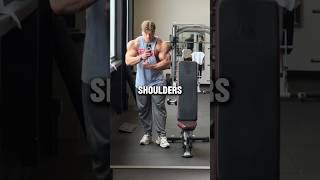 How does this bodybuilder have such wide shoulders?