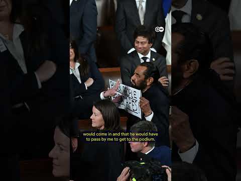 Rep. Al Green removed from Trump's State of the Union address over 'apes' protest sign | DW News