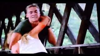 Blondie kicks dude in the balls
