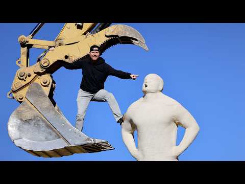 DESTROYING OUR GIANT CONCRETE STATUE!