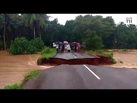 Kerala road cave-in as flood water rushes in
