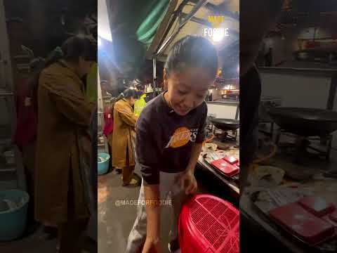 Beautiful hardworking Ladakhi girl selling variety of momos in jammu