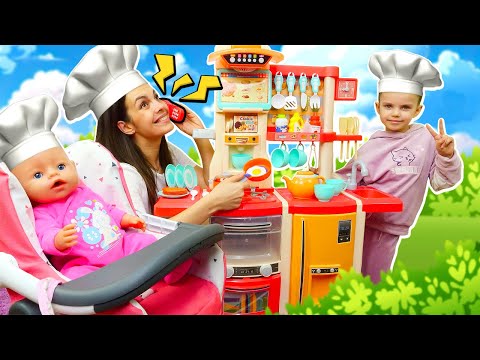 La nueva estufa de Maya y Lina. Juego de cocina para niños.