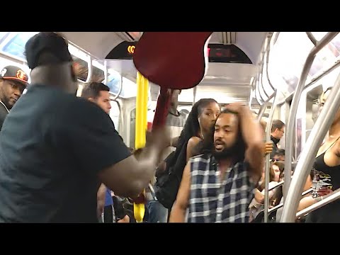 Man Breaks Performers Guitar On The Subway