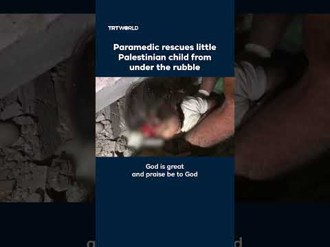 Paramedic rescues little Palestinian child from under the rubble
