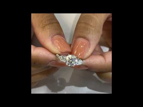 Round Moissanite Three-Stone Ring