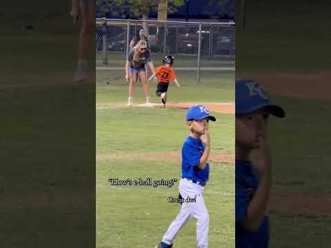 T-ball player runs to third and the 3rd base coach trucks him to the ground!