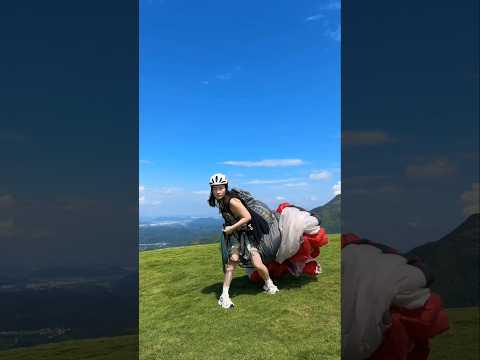 This girl throws the parachute forward first