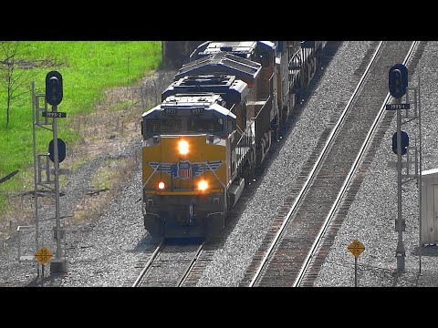 Pair of Union Pacific Locomotives Leading CSX Freight Train