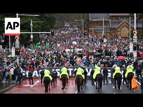 YouTube video thumbnail: Thousands March Across Sydney Harbour Bridge in Support for Palestinians in Gaza