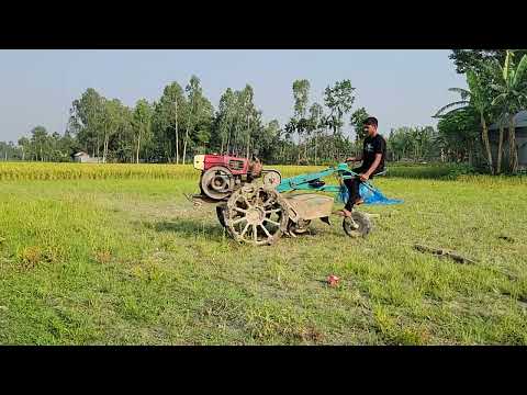 Boy driving power triller machine in village farming Area Bangladesh।
