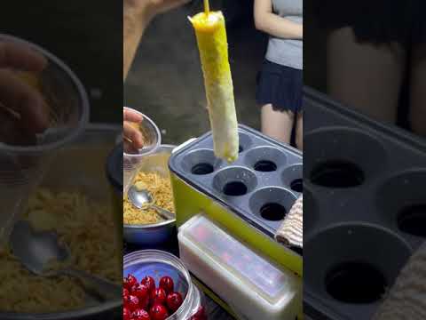 Asian street food - Grilled rice paper, sausage with eggs, grilled chicken