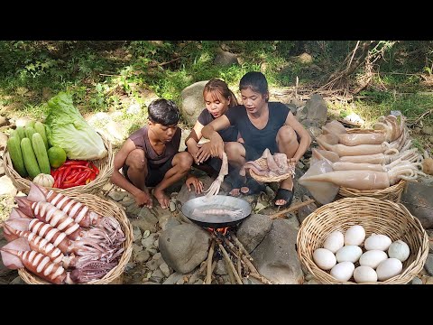 Squid salad cooking with Chili sauce - eating delicious in forest