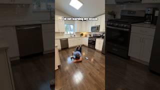 Trying to throw cups into a sink