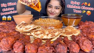 20 SPICY CRISPY CHICKEN DRUMSTICKS, CHEESY CHICKEN TACOS, SPICY BULDAK KIMCHI NOODLES & EXTRA GRAVY 