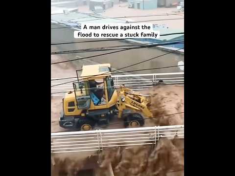 A man drives against the flood to rescue a stuck family