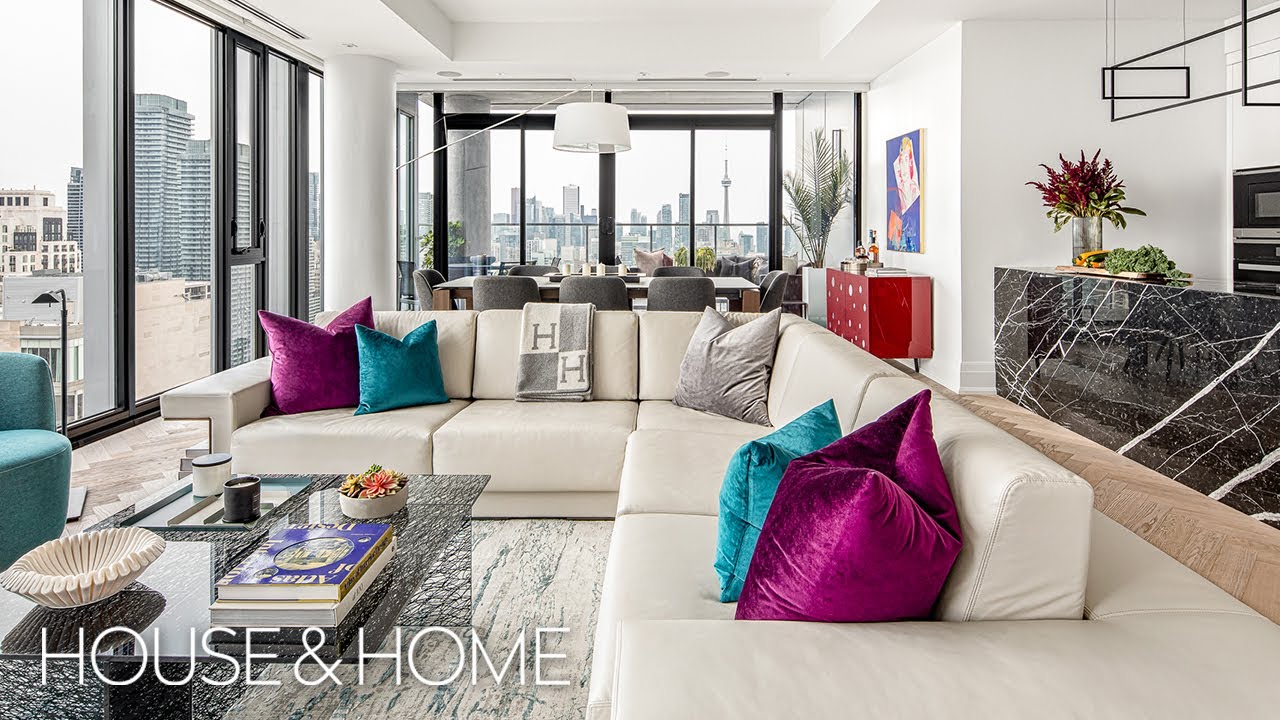 Inside a Tailored Condo Filled With Whimsical Art And Bold Pops of Color