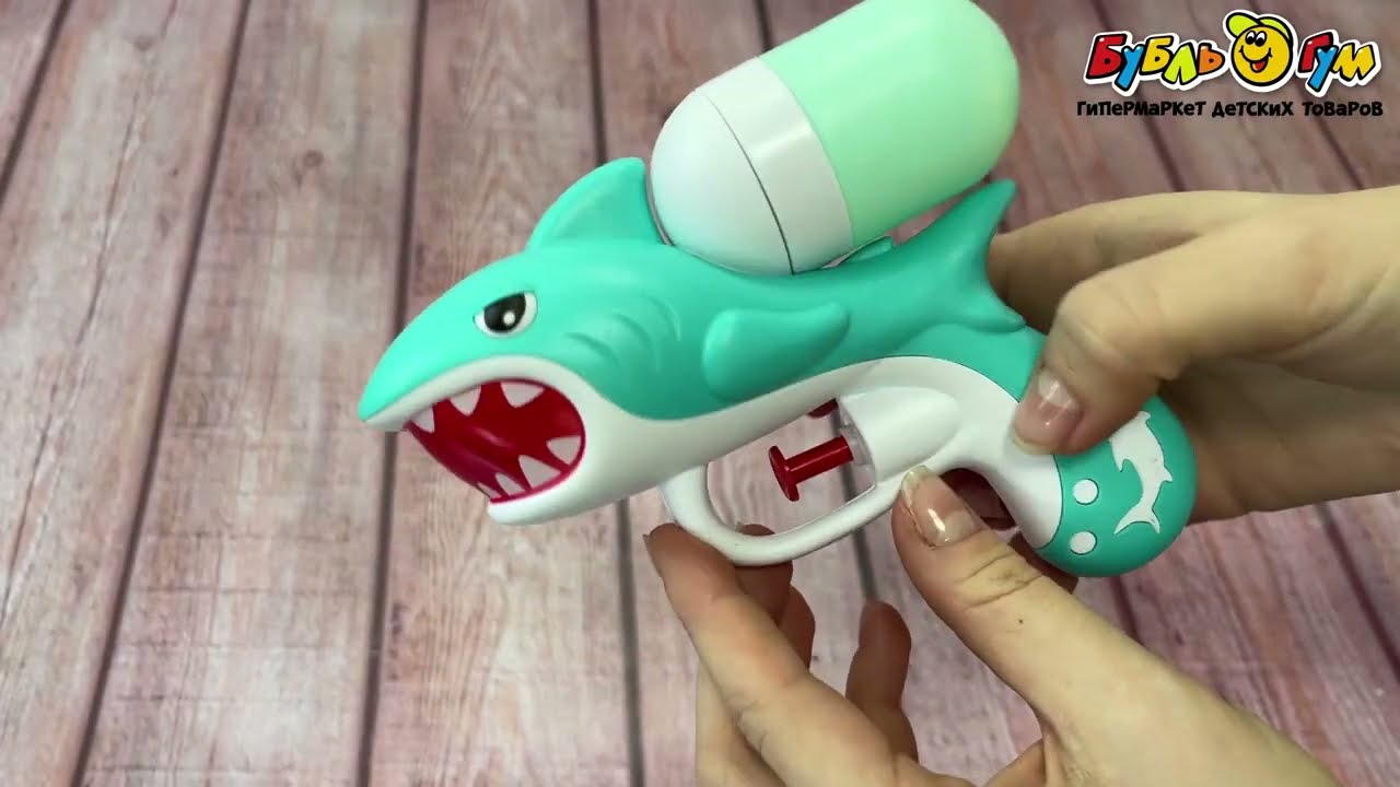 Пистолет водный Акула 14см в ассортименте  - видео Пистолет водный Акула 14см в ассортименте  - видео