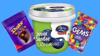Decorate Black Currant Ice Cream With Cadbury Shots And Cadbury Gems