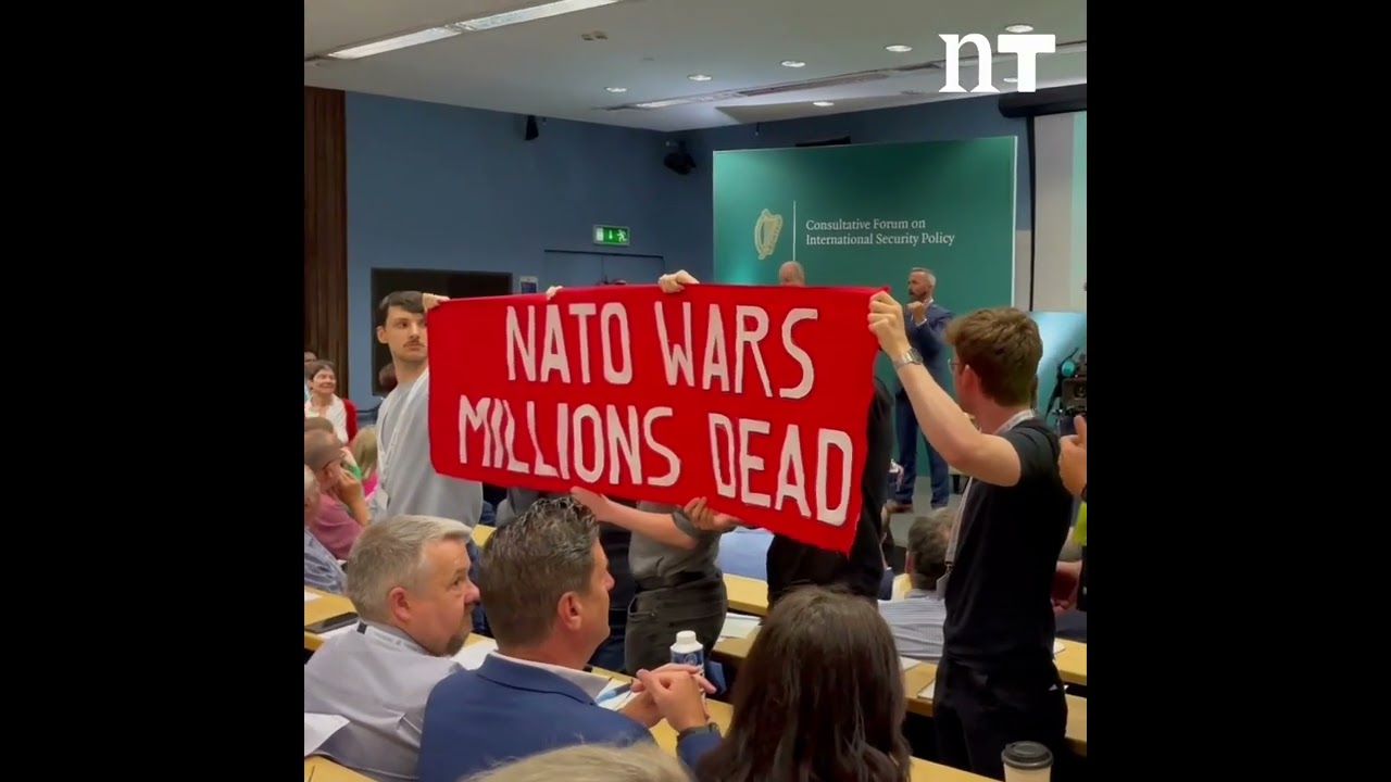 Protesters Interrupt Tánaiste at International Security Forum