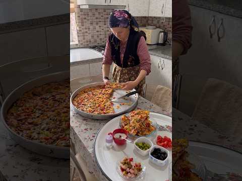 Dev pizza yapımı