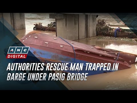 Authorities rescue man trapped in barge under Pasig bridge | ANC