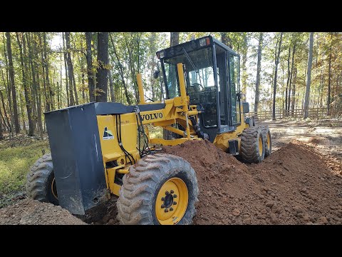 Installing The Culvert Pipe And Finishing The Road