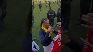 Michael Olise signing a Bayern shirt after the game | Colombia vs France