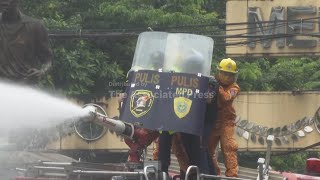 Philippines police arrest 17 for hurling rocks as thousands peacefully protest corruption