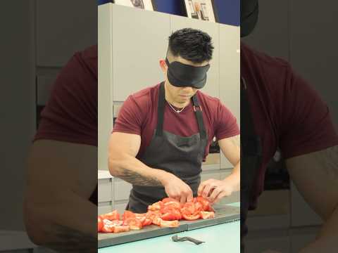 Most tomatoes cut in one minute whilst blindfolded - 9 by Wallace Wong ??