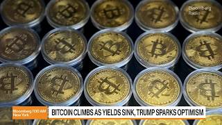 YouTube video thumbnail: Bitcoin Roars Past $70,000 as Yields Sink, Trump Sparks Optimism