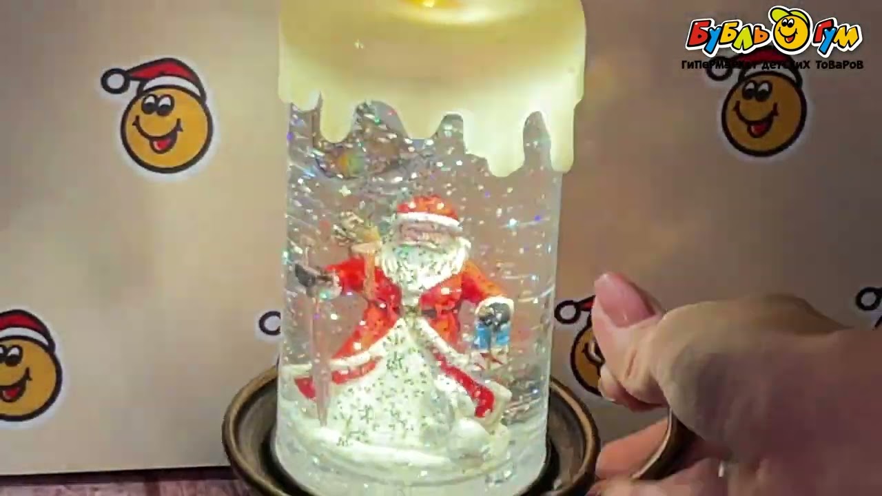 Фонарь светодиодный пластиковый Свеча с Дедом Морозом 21,5см - видео