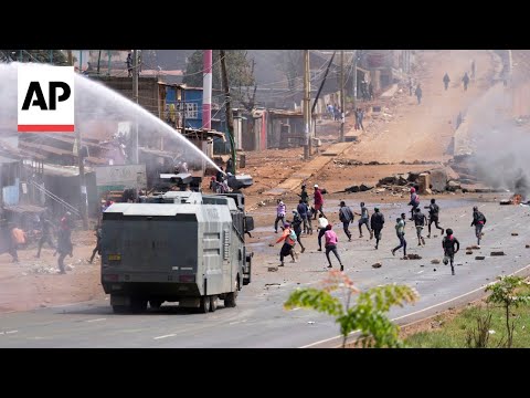 YouTube video thumbnail: Police Use Water Cannon to Disperse Protesters in Nairobi, Kenya