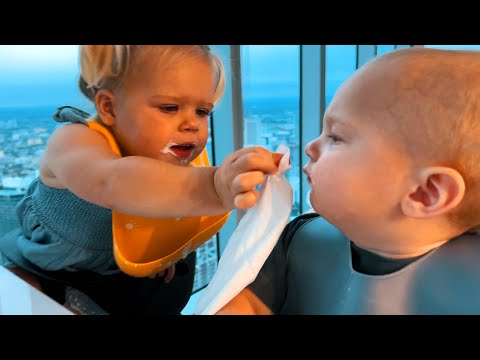 Naomi feeding her brother