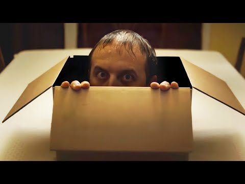 #movie  Man opens box to reveal a human head sticking out ......